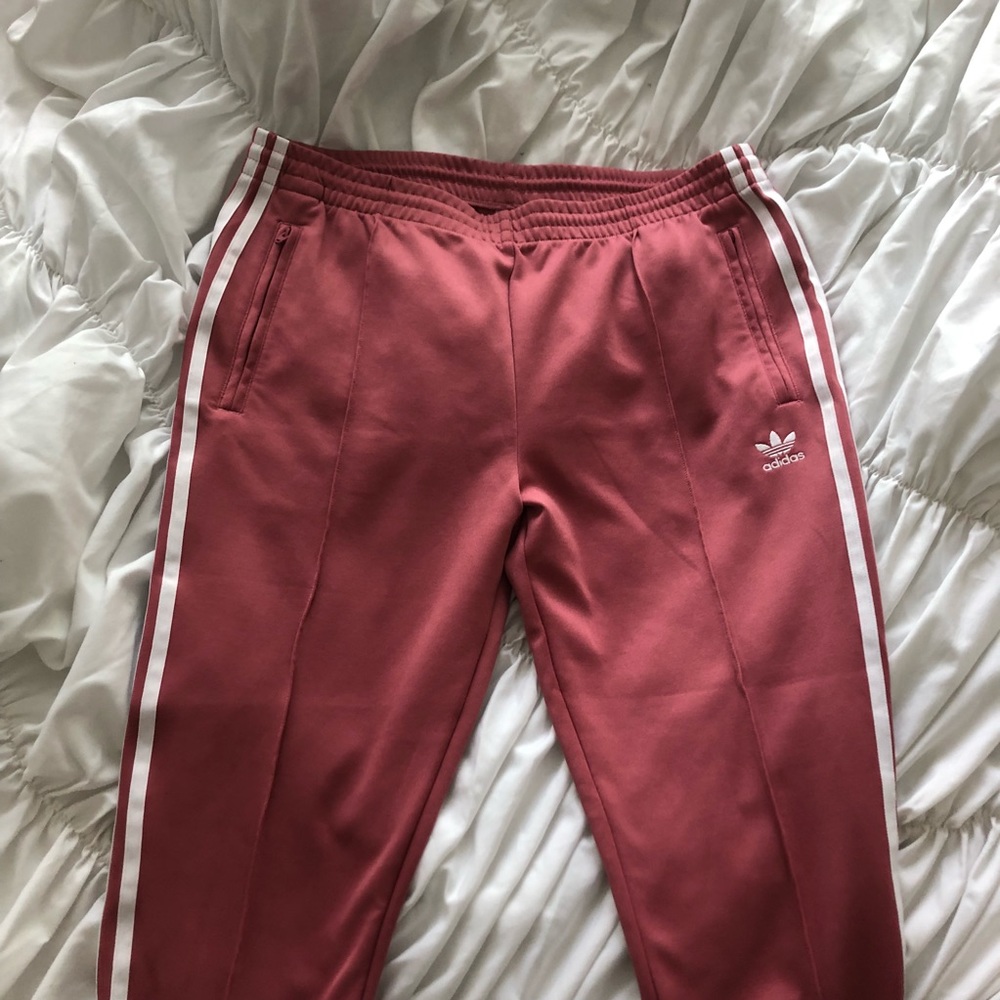 Pink adidas track pants